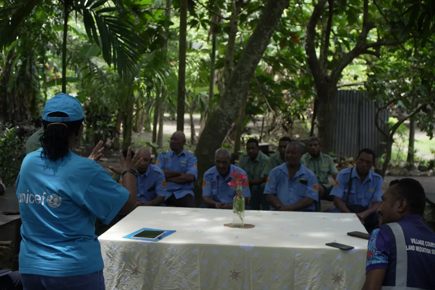 Ndangariro Moyo, UNICEF Child Protection Specialist, addresses Hood Point Village Court Court in their open court setting