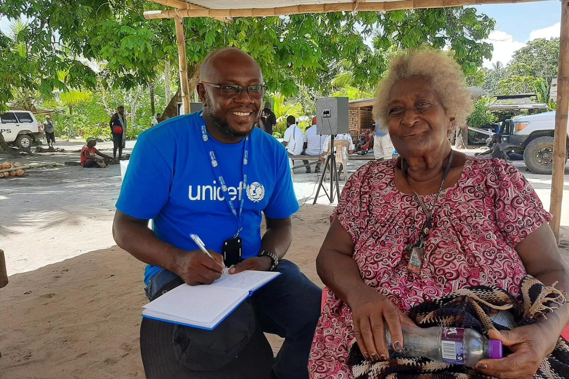 UNICEF STOP Consultant Eki George (left) with Gigila Wali (right), a 67-year-old retired teacher who was the first member of Fatmilak community to get vaccinated in New Ireland Province.