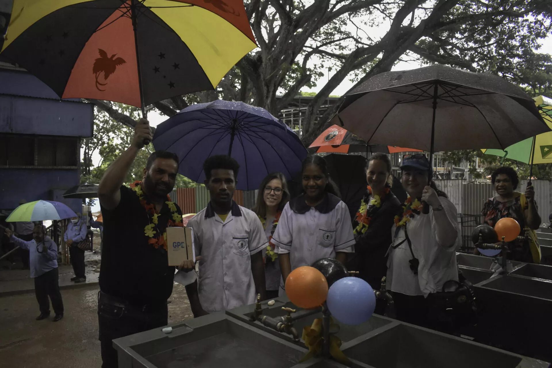 GPE team, led by Muhammed Tariq Khan inspect the WASH facilities at Sevese Morea Primary School in Port Moresby.