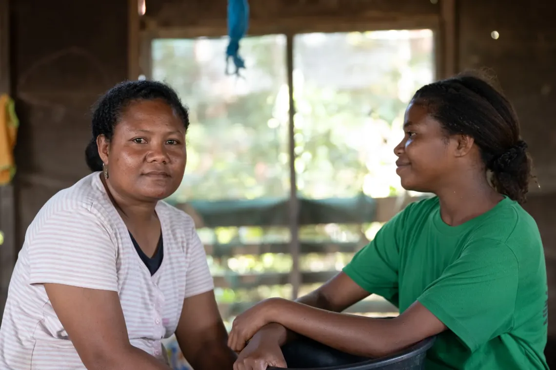 Lorna relaxed with her mother (left) after school.