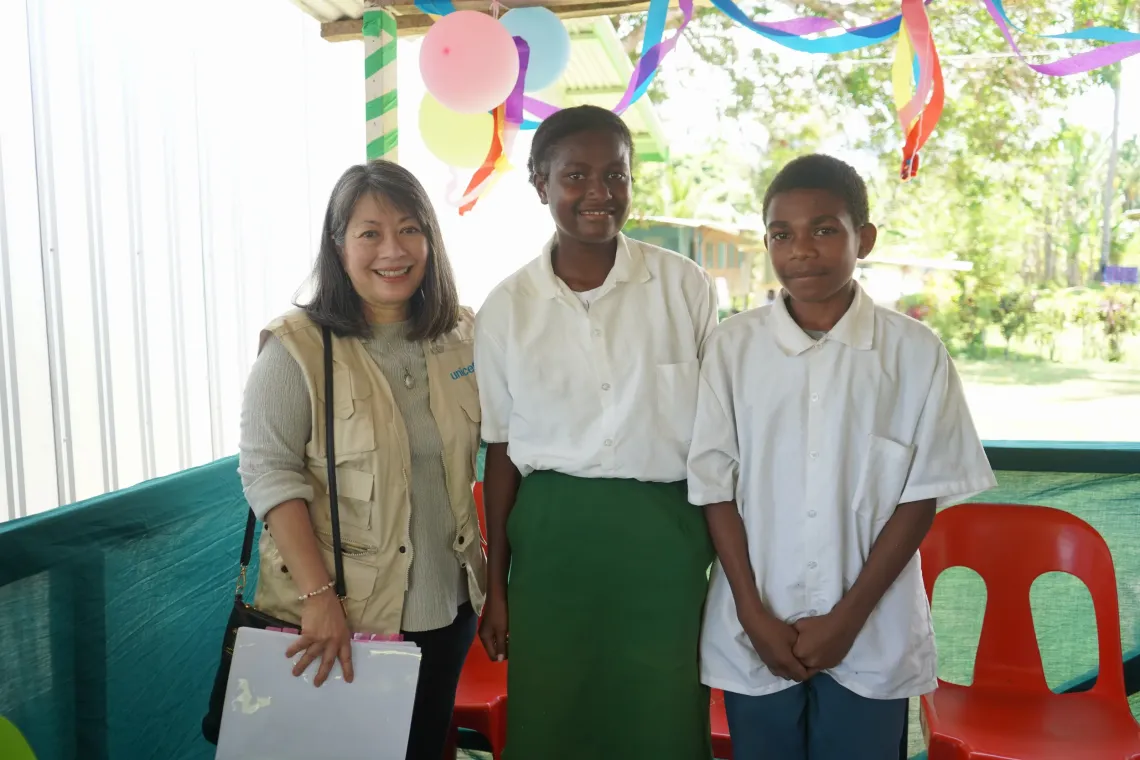 June poses for a photo with Muya Primary School student leaders