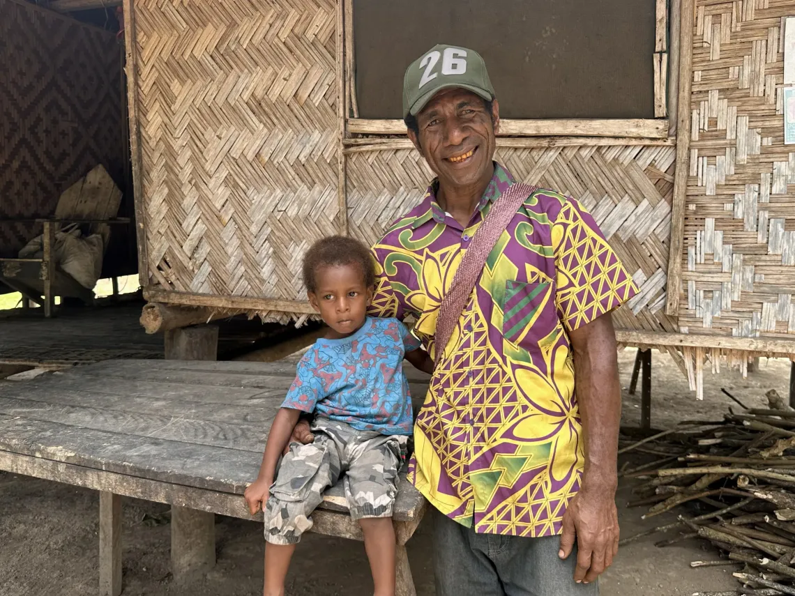 Benjamin Jim with his two -year-old son, Shalem