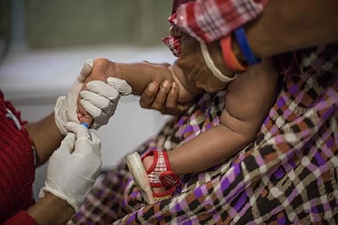 A child in the PPTCT programme during a check up