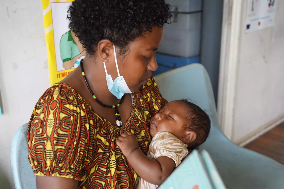 Narelle and her son, Gabriel wait to be seen at the clinic.