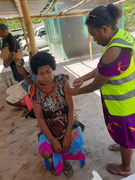 Elderly women in Fatmilak receiving their J&J vaccine, New Ireland Province