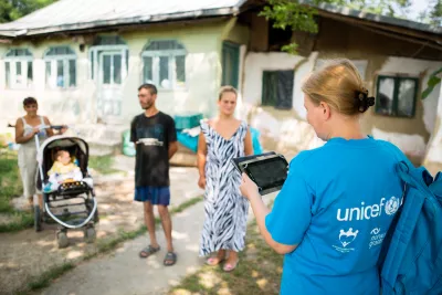 UNICEF professional visiting vulnerable family in Bacau county.