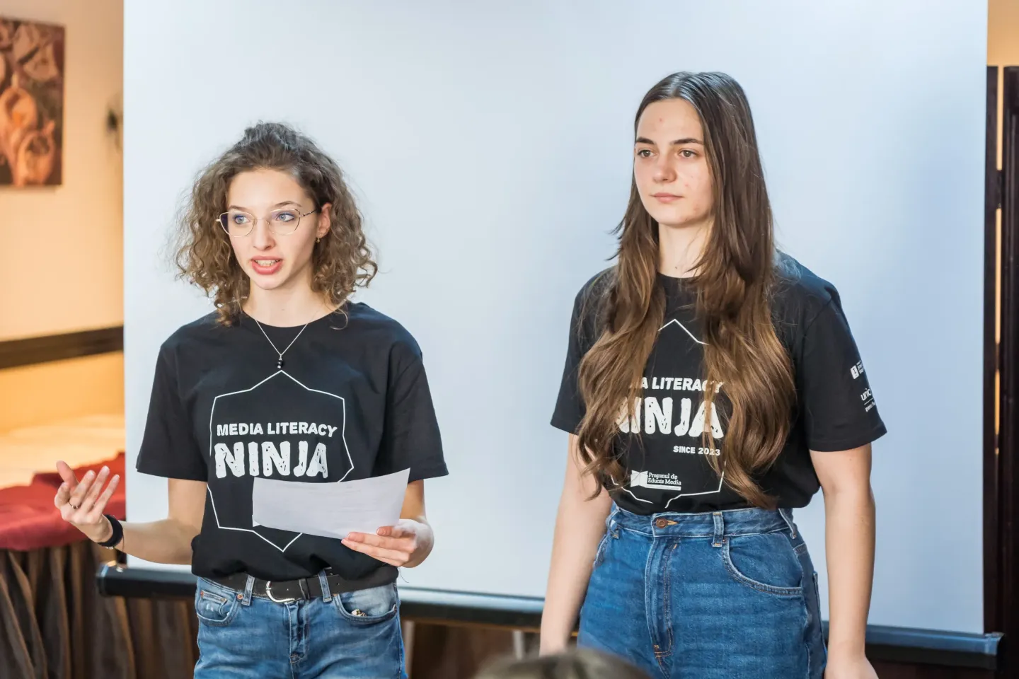 Two girls presenting