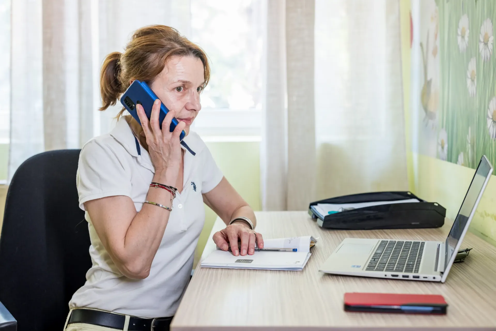 Social assistant talking on the phone
