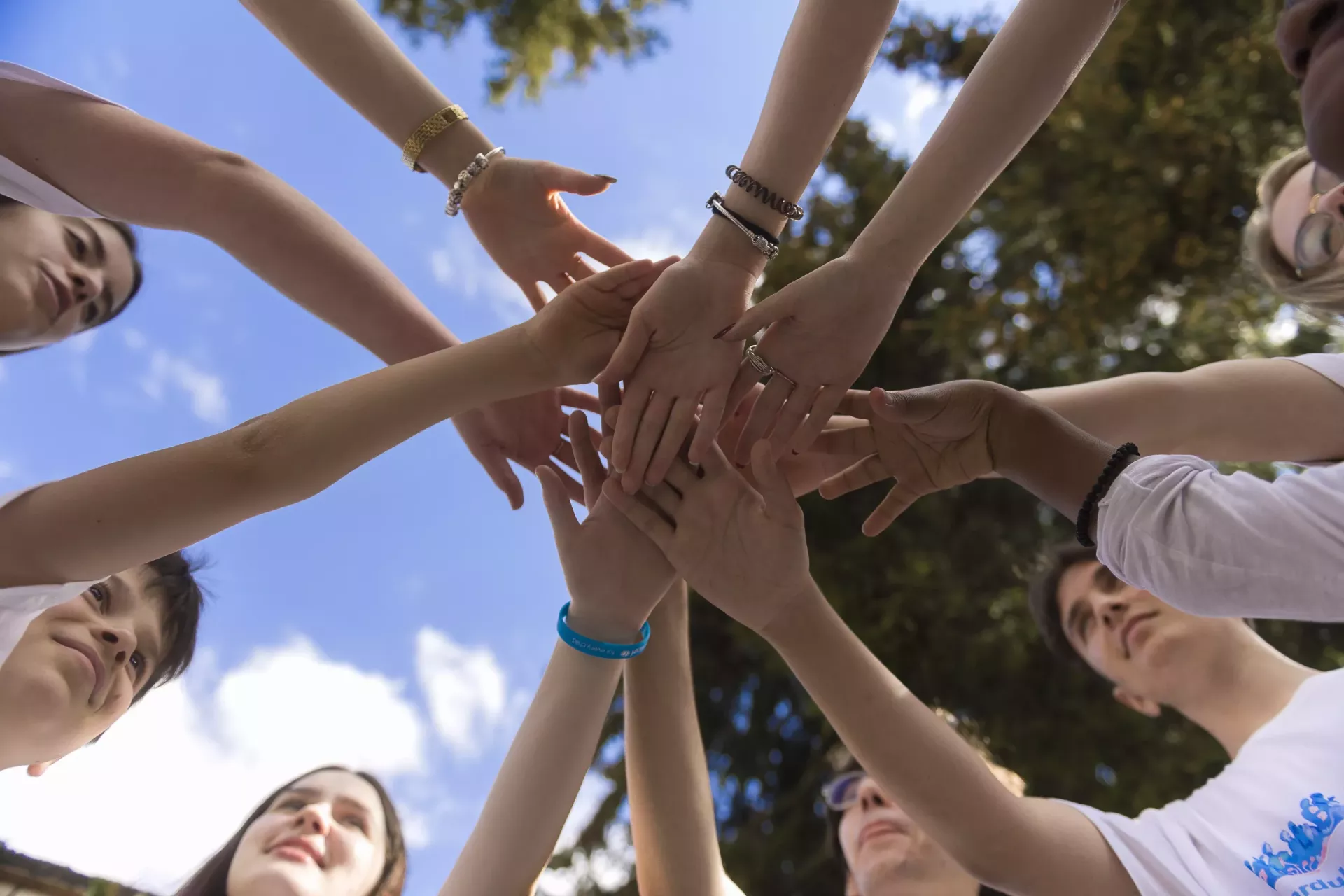 Children joining hands