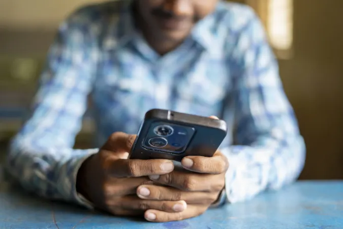 Child using his phone. 