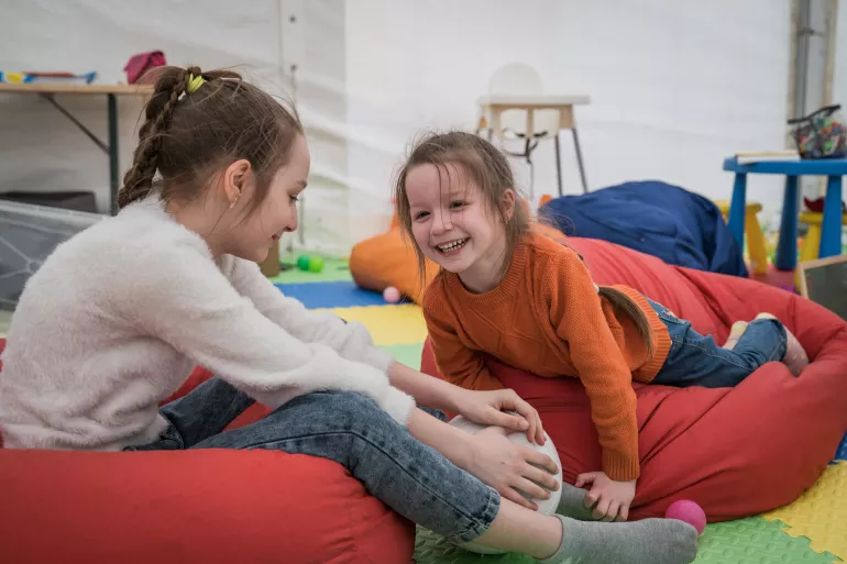 Two girls playing in a Blue Dot Hub