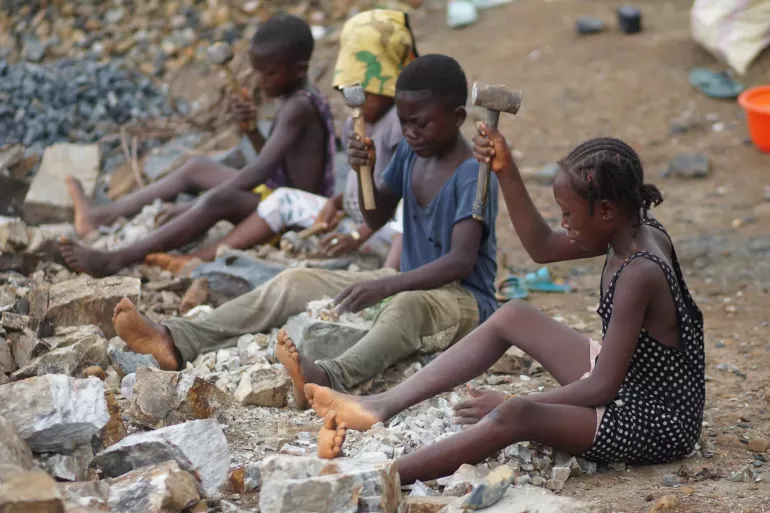  Children working in granite quarry in Sierra Leone