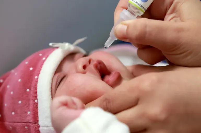 An infant is administered an oral vaccine