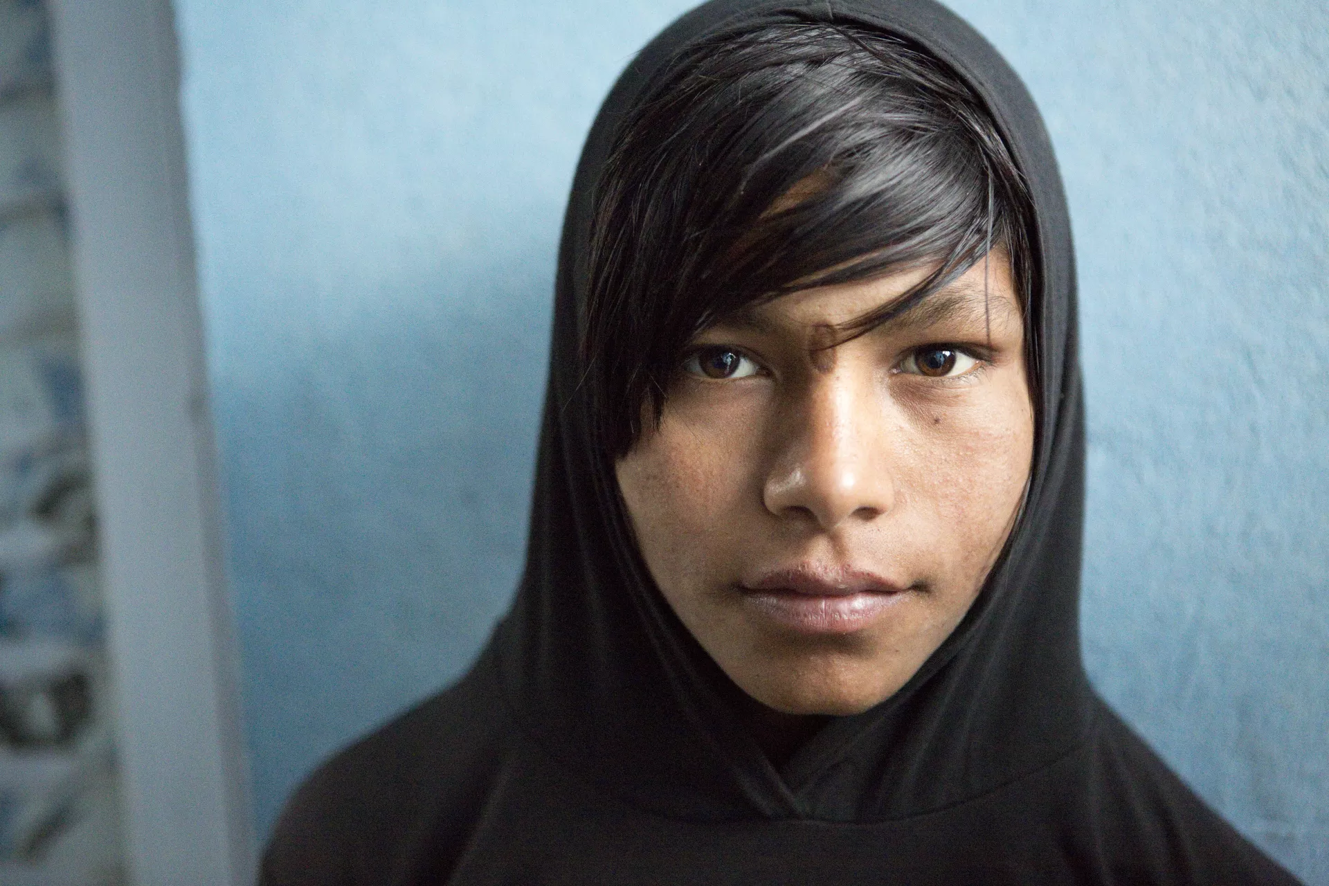 A young adolescent boy in India