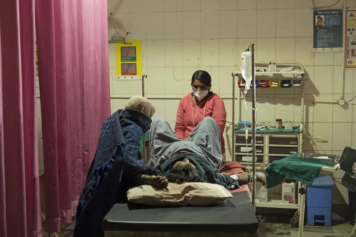 old staff nurse in the labour room of Dungapur District Hospital.