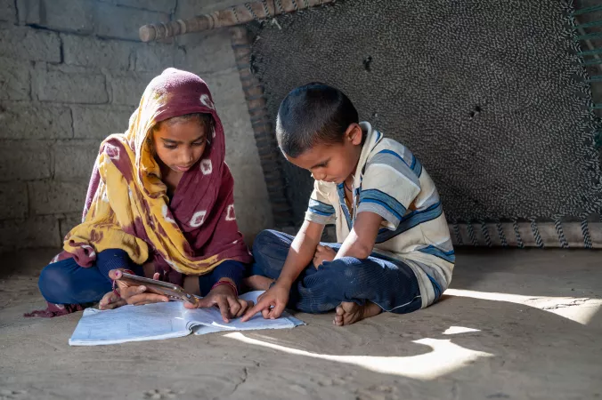 11-year-old Prijal (left) and 8-year-old Arun
