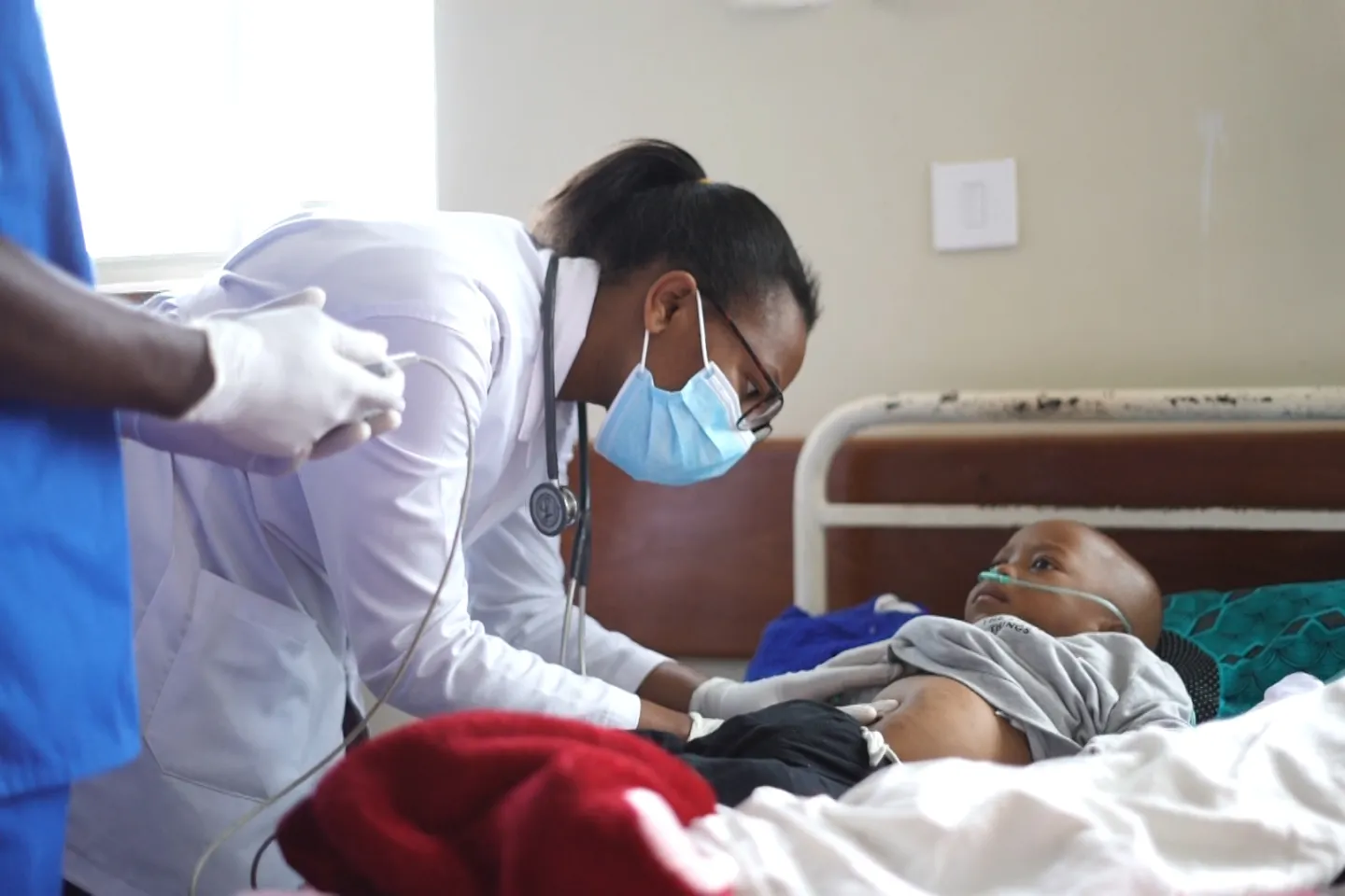 Dr. Ariane Nina Ndayikeje, Head of Pediatrics and Neonatology Department at Kacyiru Hospital, performs a consultation