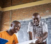 a teacher supporting the student
