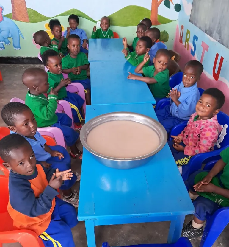 Children waiting to take porridge
