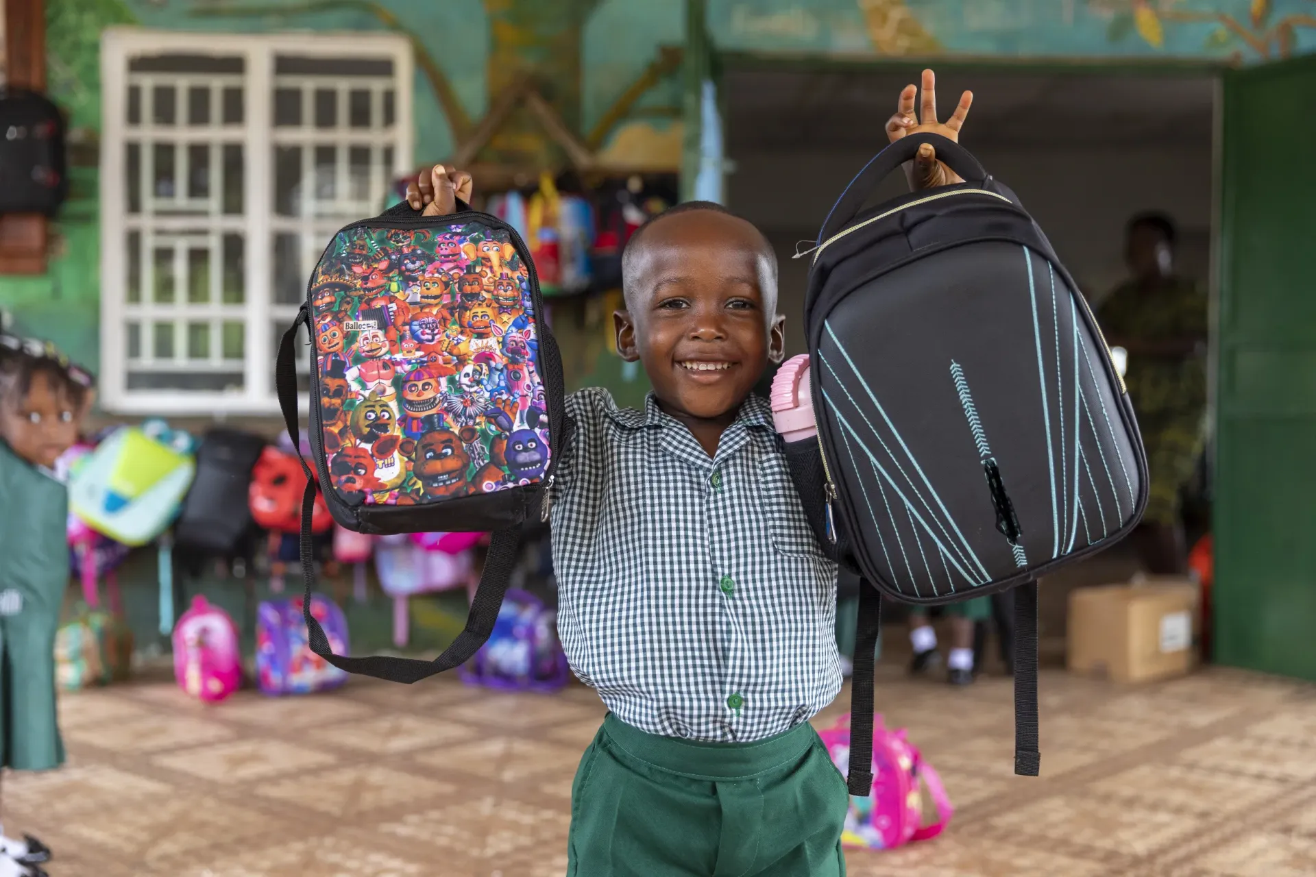 A pupil of the Rural Education Committee Pre-school on the first day of school.