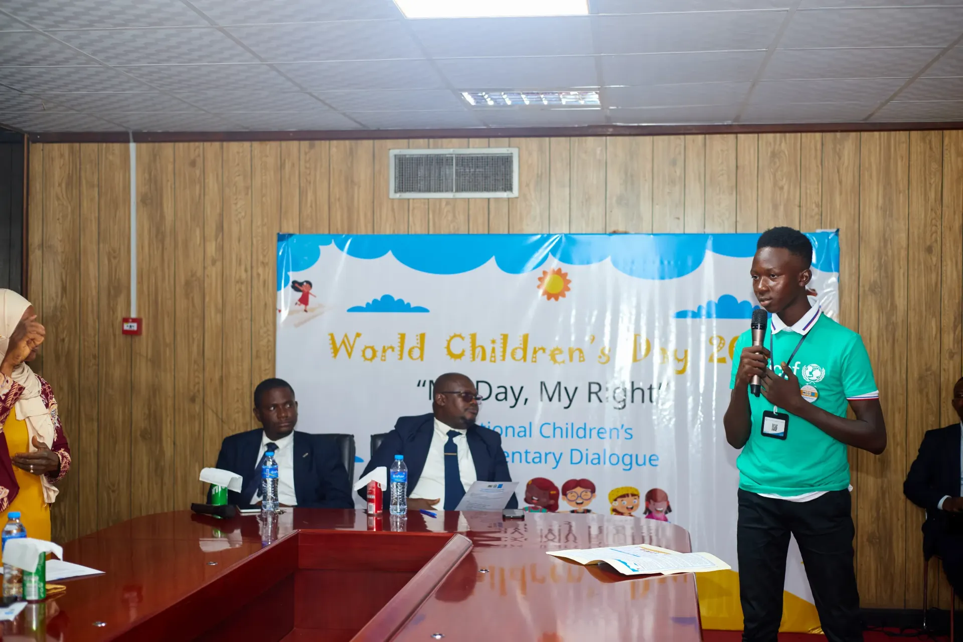 A child rep presenting a Call to Action to Members of Parliament in Freetown.