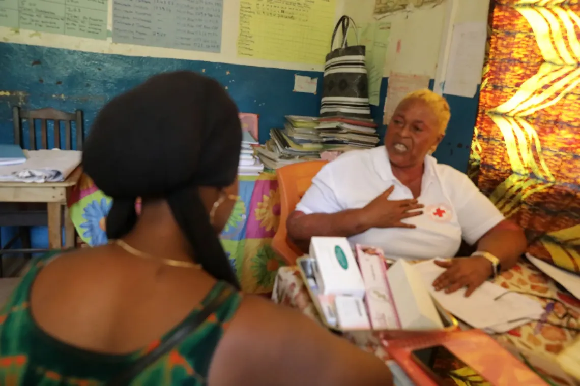 An adolescent accesses sexual and reproductive health education and counseling from a health worker at a Community Health Centre in Port Loko after the training 