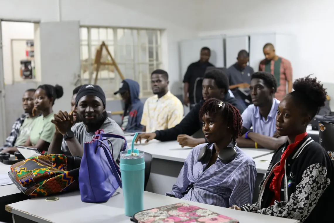 Adeola Elizabeth Ademosu,a third-year Software Engineering and Multimedia student, attends a lecture on Digital Public Goods at the Limkokwing University of Creative Technology in Freetown. 