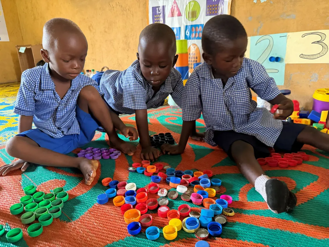 Children use a play-based activity to learn through participation and interaction at the Konsho Early Childhood Development Center. 