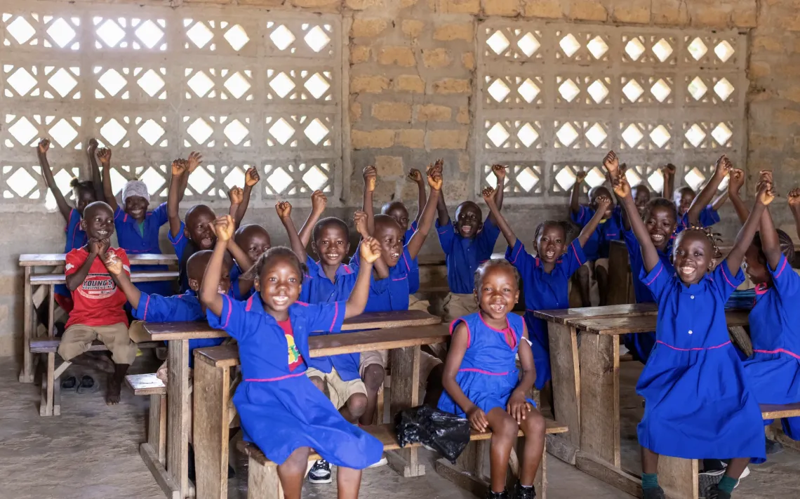 Photo of children happy in class at Bombali district during a photo