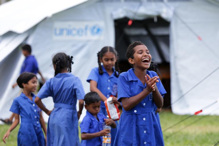 school-girls-outside-temporary-school-tent