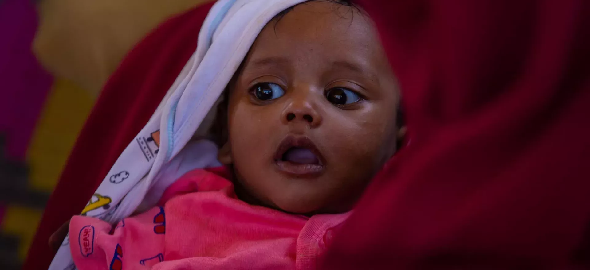 Sudan. A mother and her child attend a session on infant and young child feeding at a health centre in Kassala State.