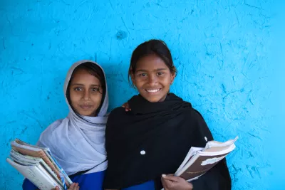 (Left) Momota and (Right) Anita Roy, student of Class VI, attend Krishnopur High School, Rokonpur, Chapai Nababgonj on14 February 2013.