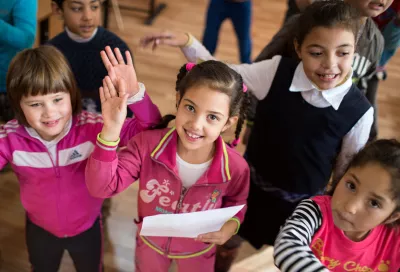 Convention on the Rights of the Child: Children rehearse a song together in a school in Romania.