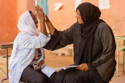 Sudan: 15-year-old Walaa shares a light moment with Noha, a counsellor after a session at the UNICEF supported Alshargia safe learning space or Makanna in Kassala state.