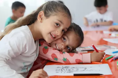 Children playing during the early childhood education programme at Islahiye temporary accommodation center at Gaziantep, T&uuml;rkiye.