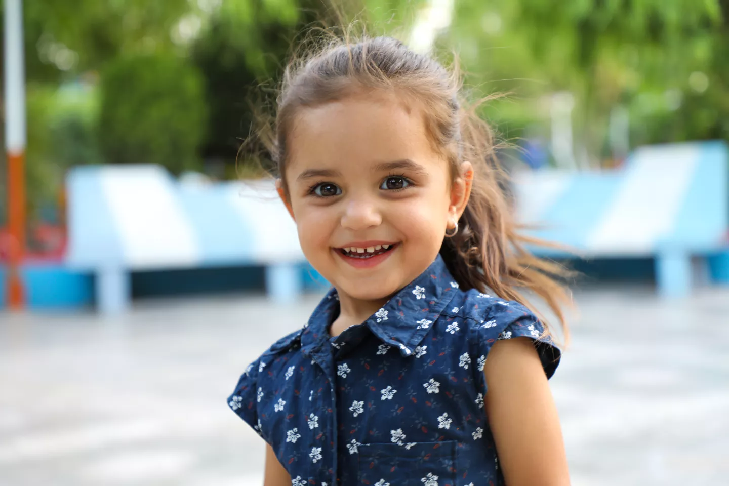 After the government of Afghanistan announced the reopening of activities, Rahila, seven years old, came to the park to play with her father after four months of quarantine.