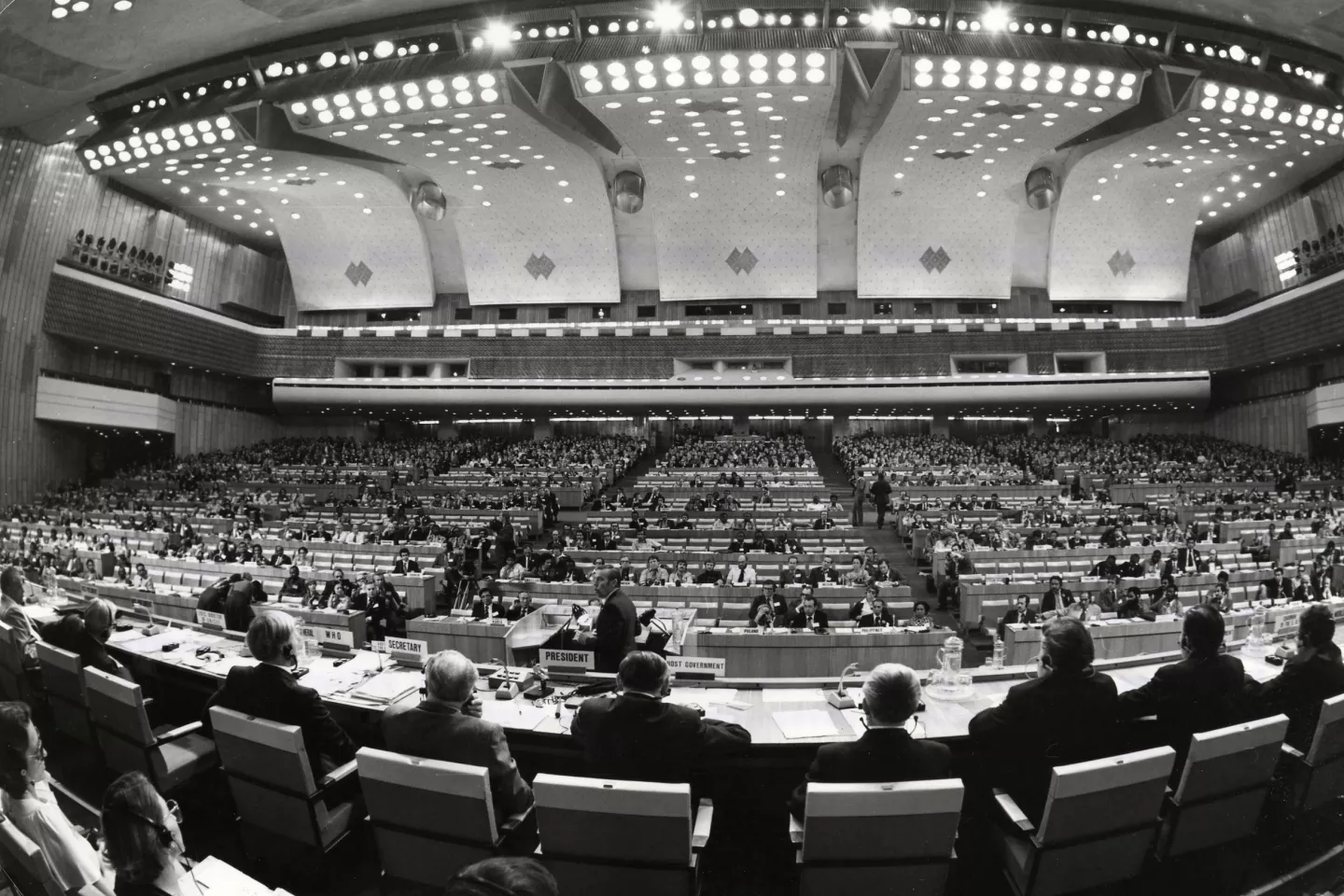 A fish eye lens view of a filled conference hall