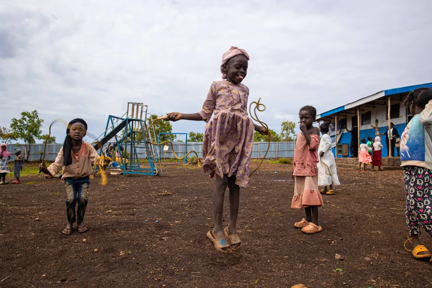Young displaced girls playing in a Child-Friendly Space (CFS)