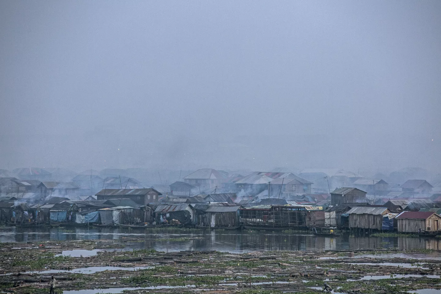 Smog covers Makoko, a fishing community mostly made up of structures on stilts above Lagos Lagoon, in Nigeria.  