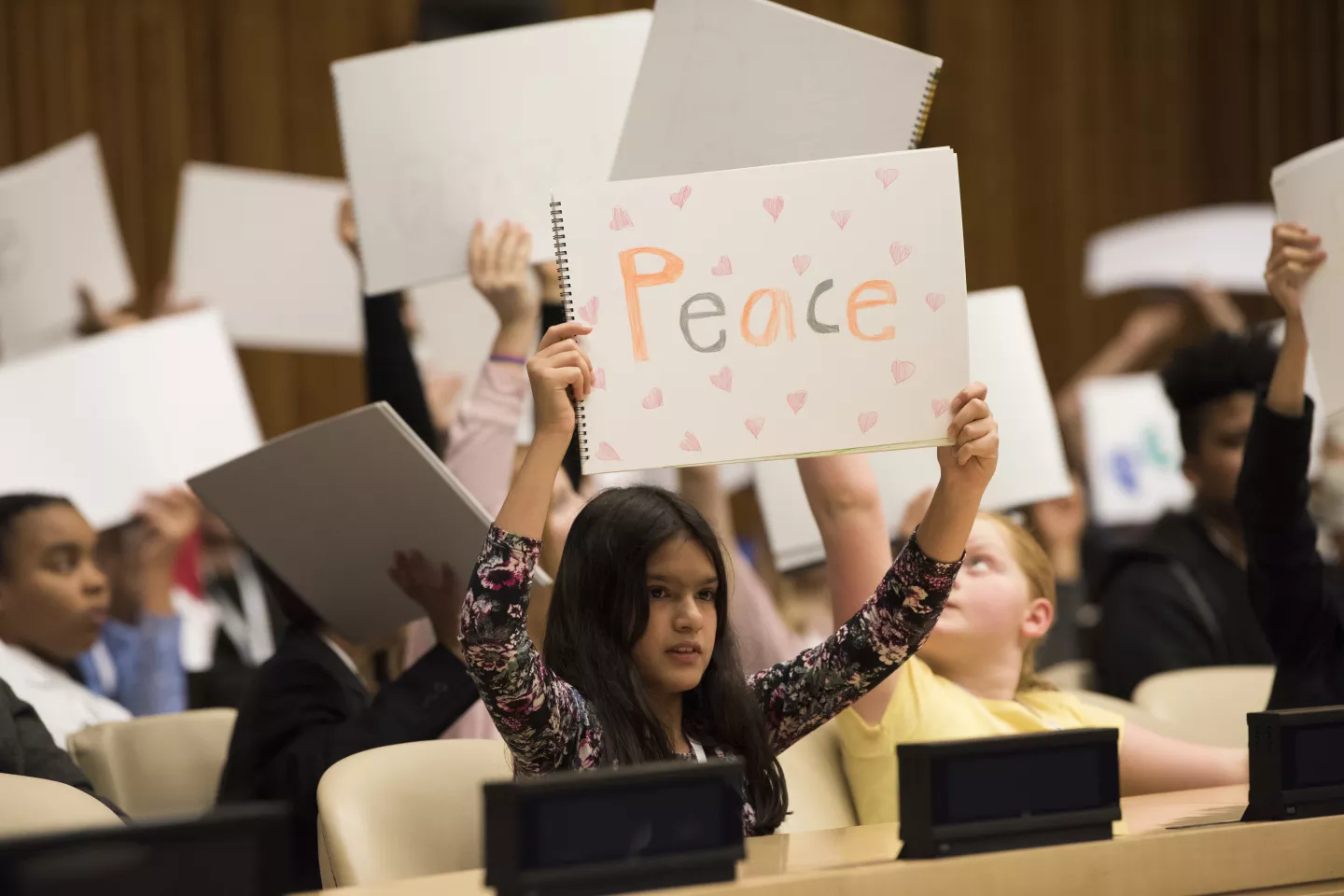 Convention on the Rights of the Child: Children hold up drawings at an event to mark World Children&rsquo;s Day in the United Nations Headquarters, 2017.