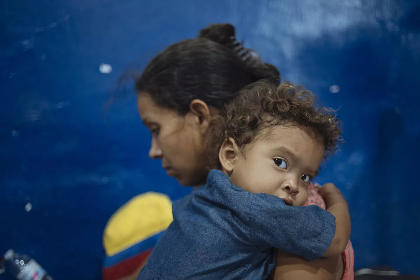 Colombia. A mother holds her child.