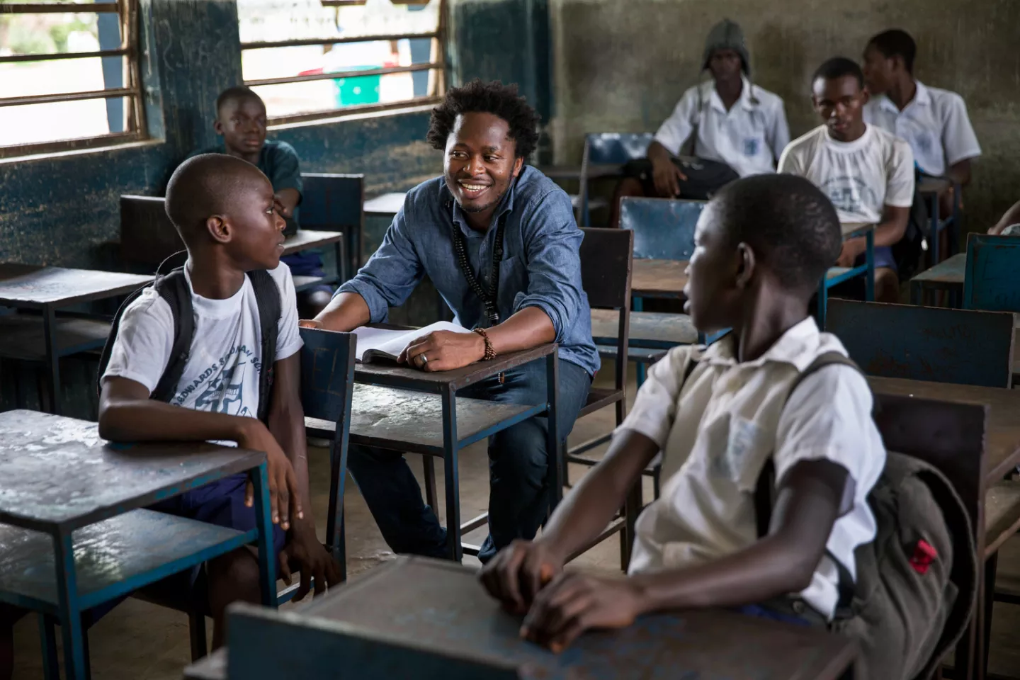 Ishmael Beah talks to students in a school