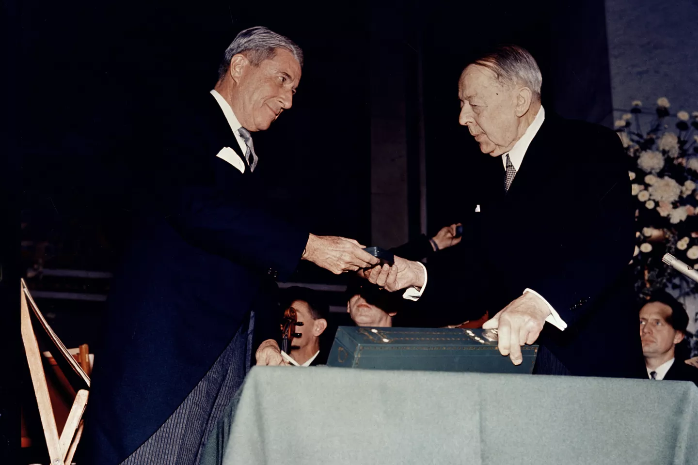 UNICEF Executive Director Henry Labouisse (left), receives the Nobel Peace prize medal on behalf of UNICEF, presented by Nobel Committee Chairman of the Norwegian Parliament, Gunnar Jahn, at the prize ceremonies at Oslo University in Oslo, Norway.