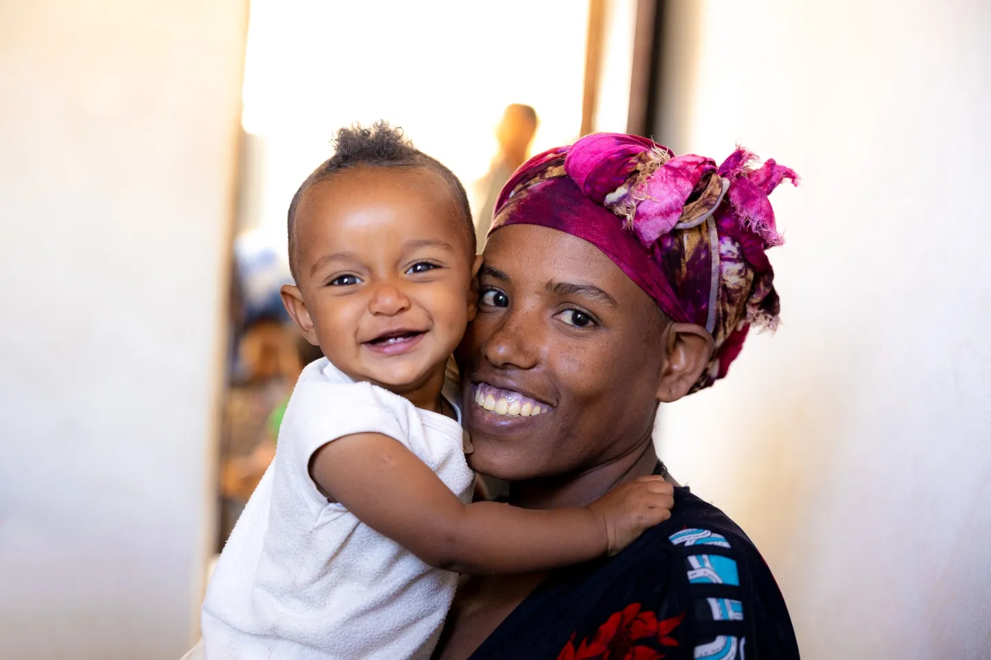 One-year-old Dagem is a happy baby! Besides providing him with a healthy, balanced diet, his mum Fasica makes sure he receives all the vaccines he needs to grow up in good health.