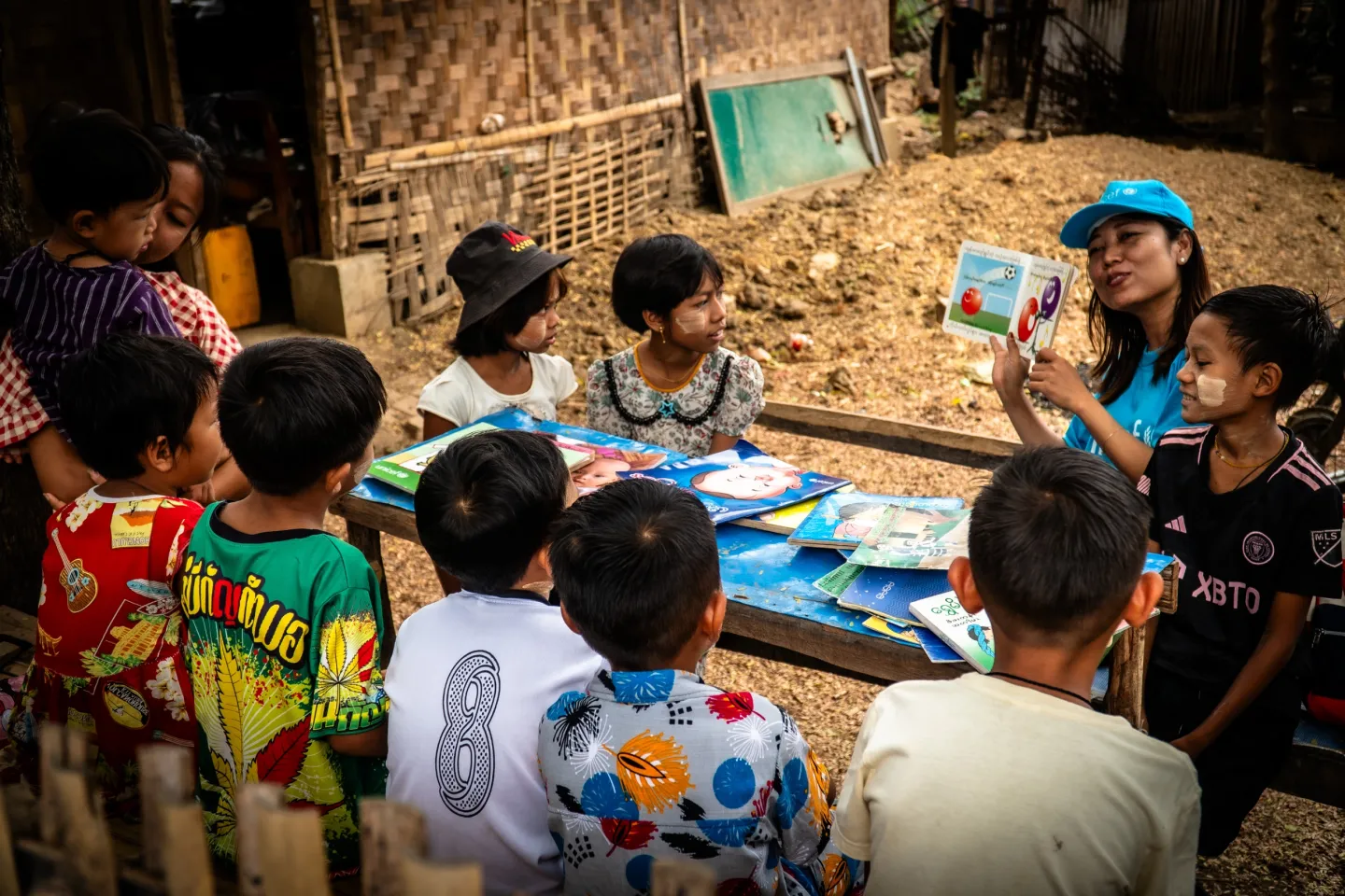 Myo Myo Wai, UNICEF Myanmar&rsquo;s Programme Officer for Education, reads stories to children affected by the recent earthquake as part of UNICEF&rsquo;s Mental Health and Psychosocial Support (MHPSS) activities. 
