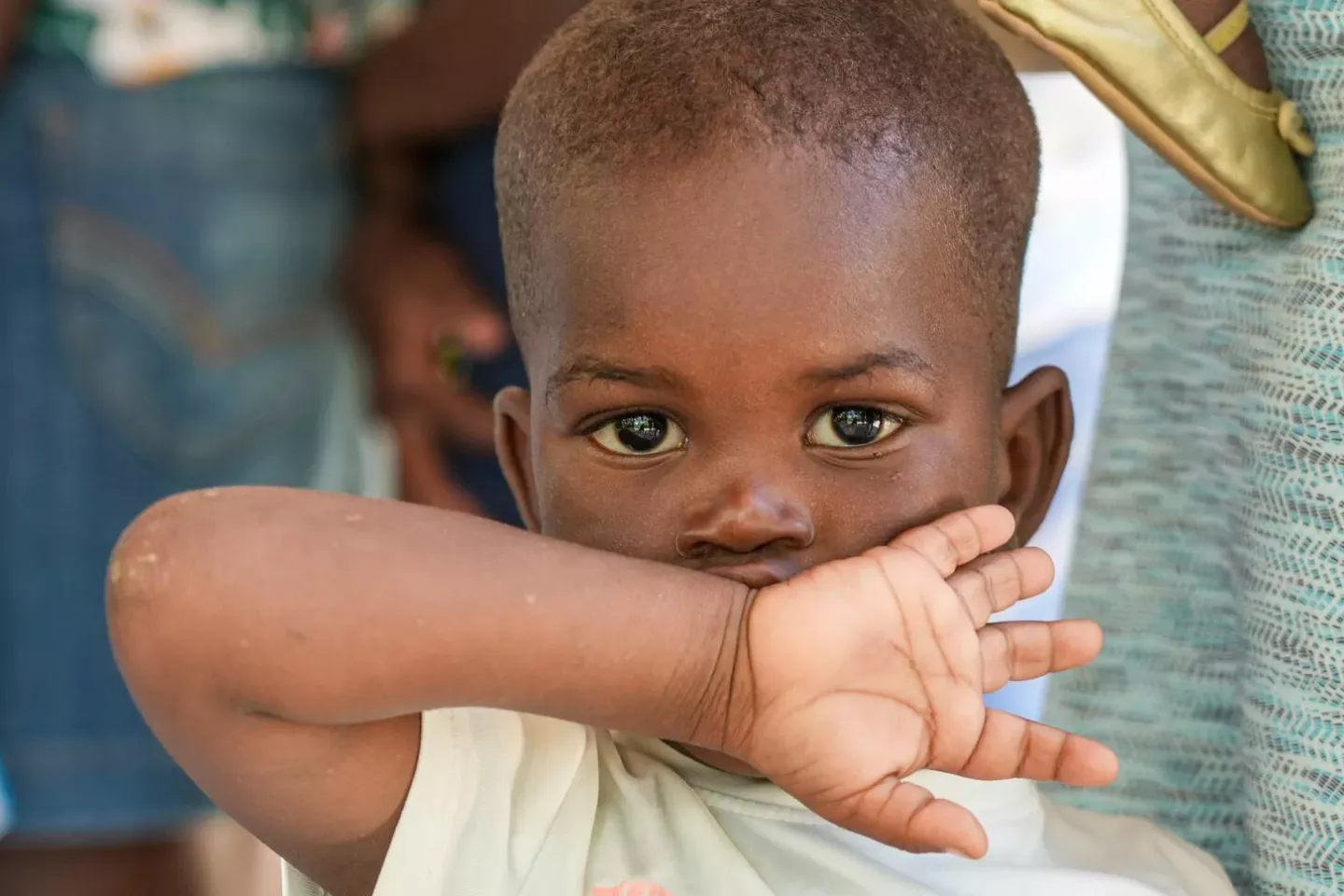 Haiti. A child gazes to the camera as he waits for his turn at a UNICEF-supported mobile clinic in Boucan Carr&eacute;, Haiti.