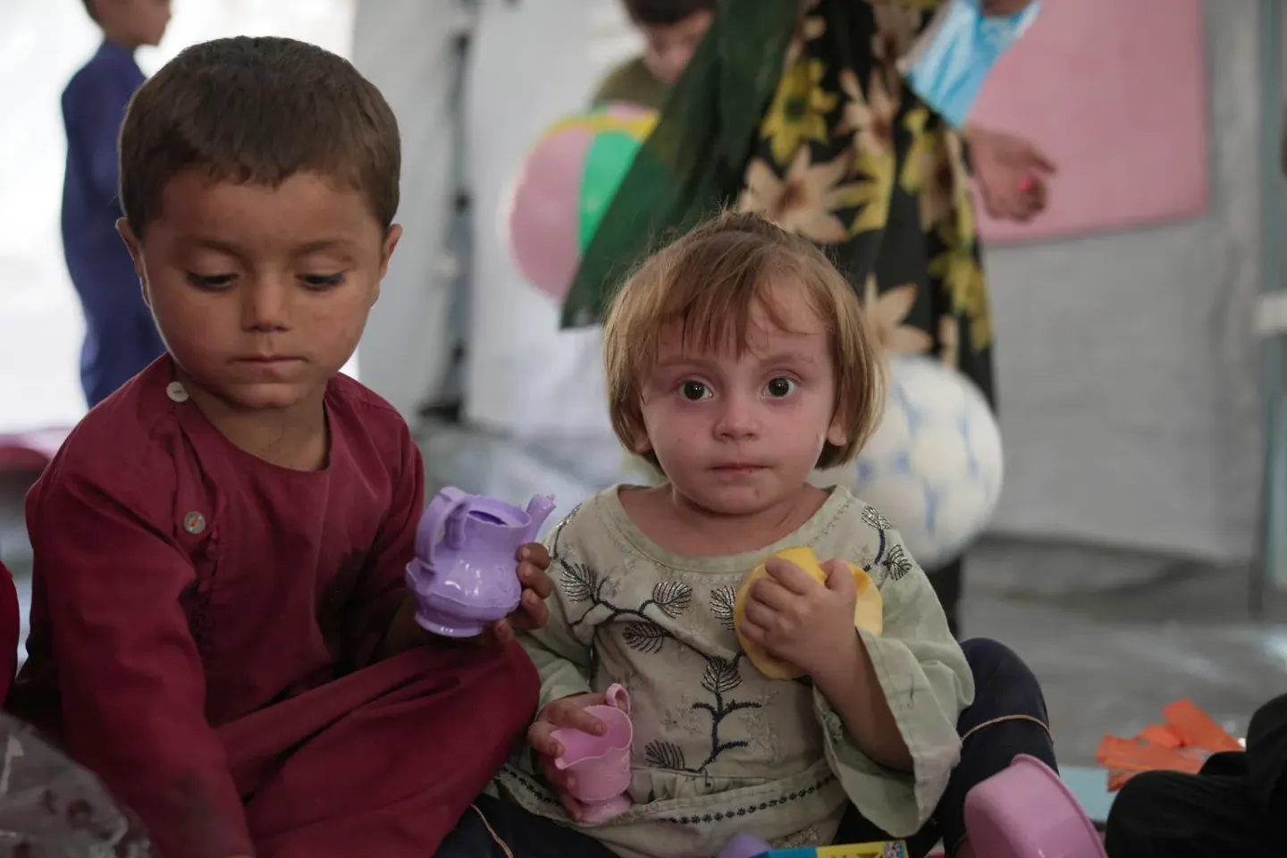 Afghanistan. Two children play at a UNICEF supported Child-Friendly Space in Kunar province.
