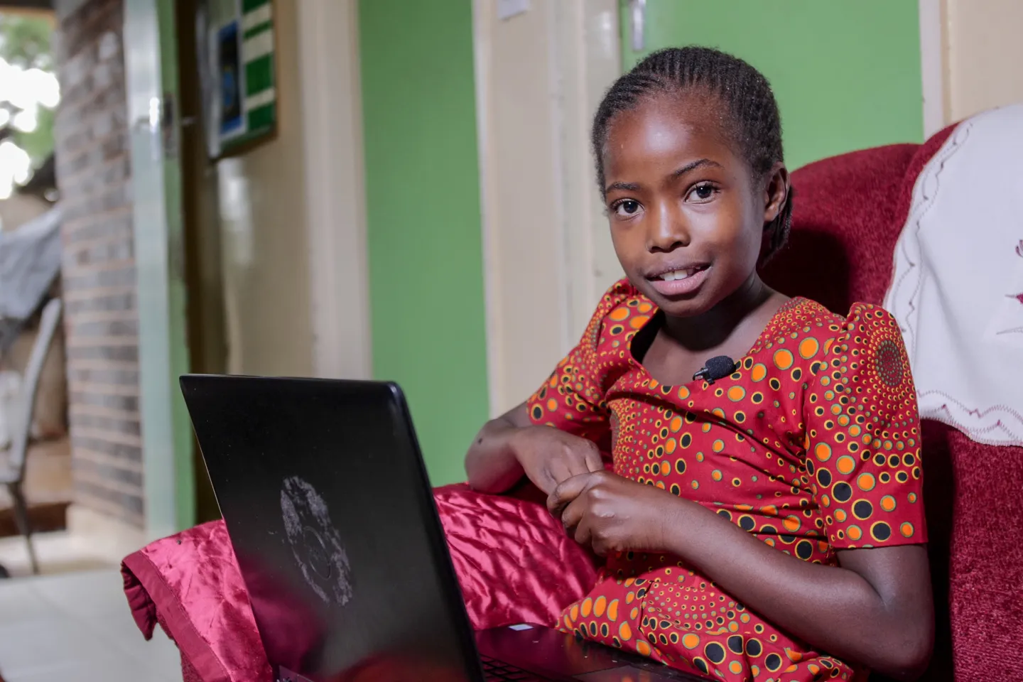 Girl in Zimbabwe accesses UNICEF supported digital education. 