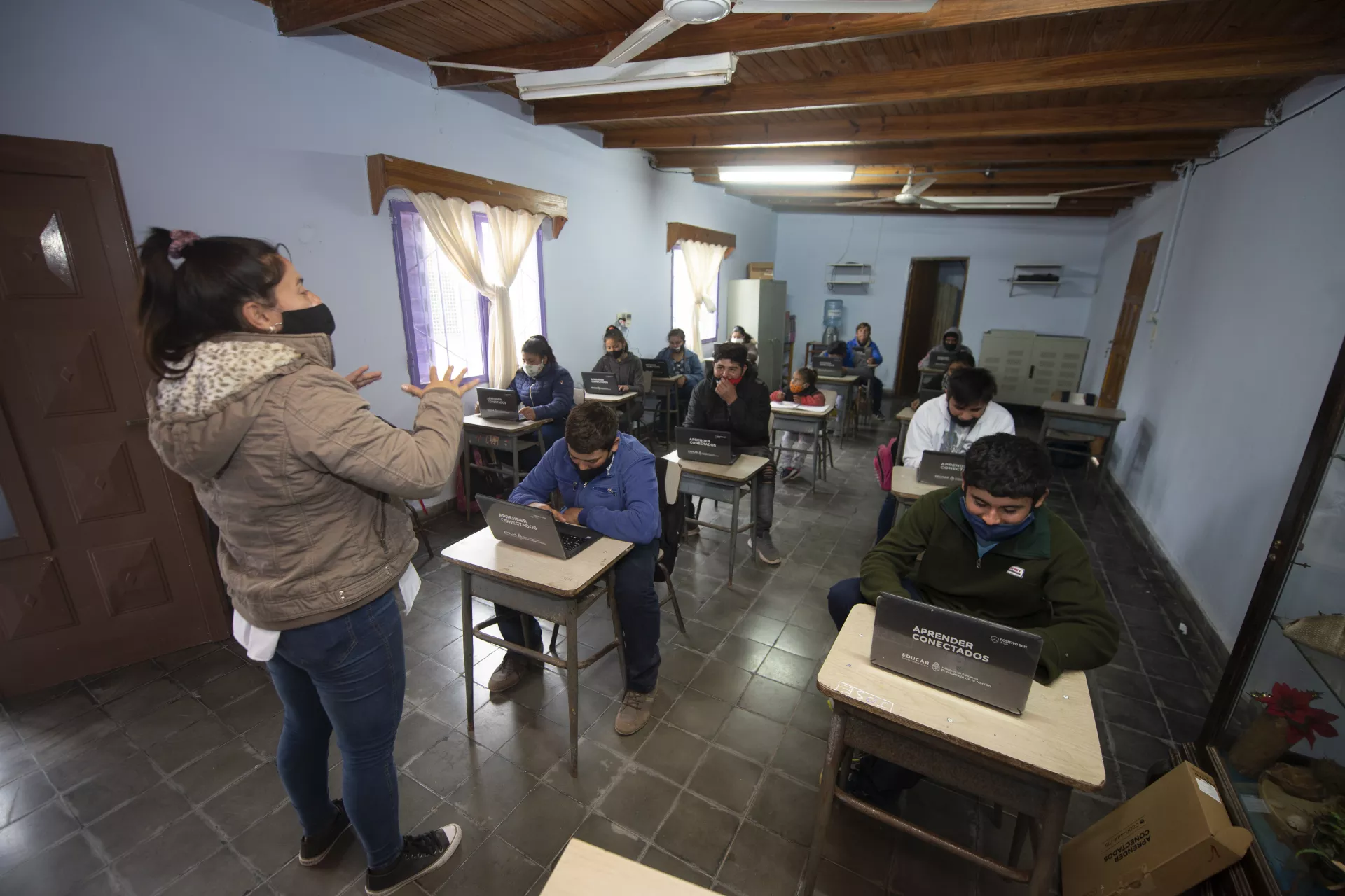 Pupils sitting at their desks in a classroom in Argentina.