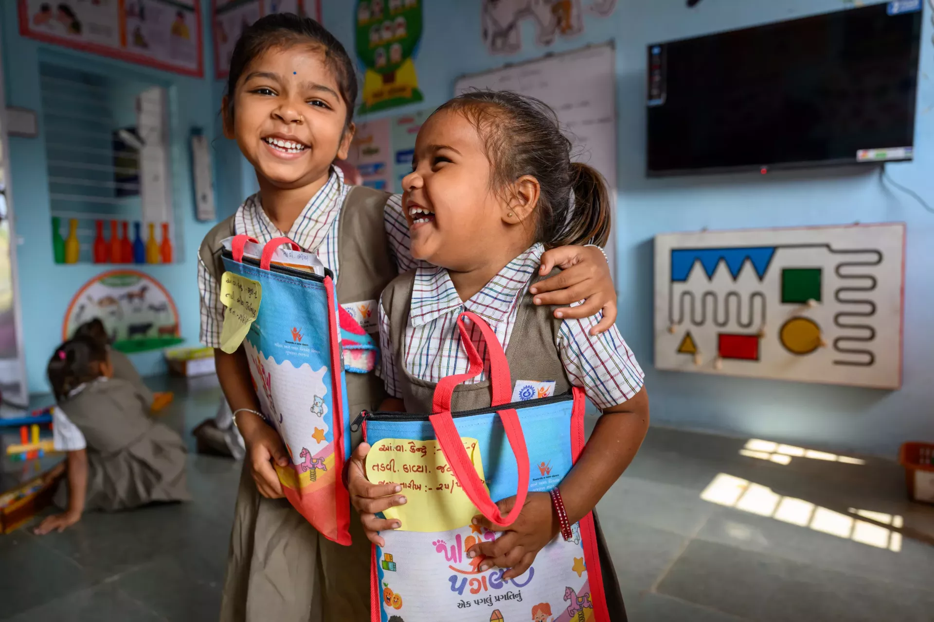 Two little girls at a new learning facility